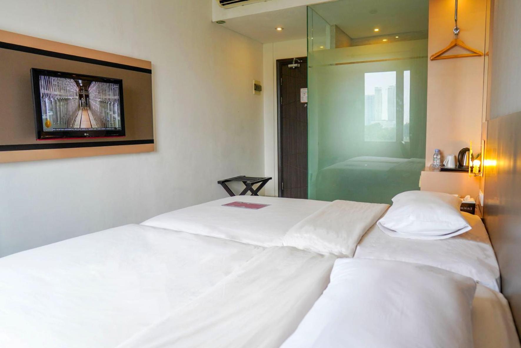 Oak Tree Urban Hotel Jacarta Quarto foto
